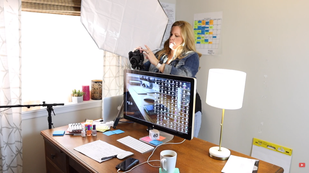 a b-roll of me setting up my camera and desk before shooting my content