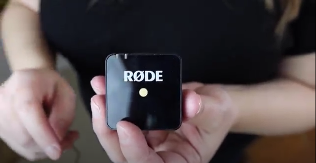 Meredith is holding the Rode Wireless Go transmitter. 