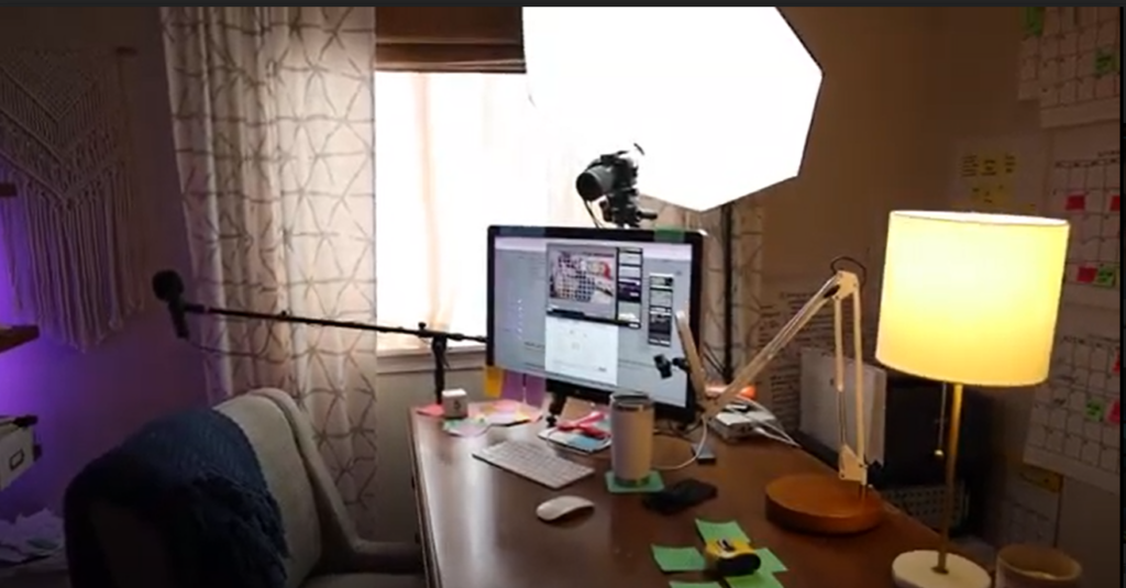 In my small office, I have my desk floating in the middle of the room. Typically when you have a room like a bedroom, you put your furniture against a wall.  However, when you make your desk float in the middle of your room, you can use the space in front of the desk for your lights, tripod, wall calendar, and anything else you need access to. Having my desk in this position seems like I'm working in a cubicle, hence the name YouTubicle. 